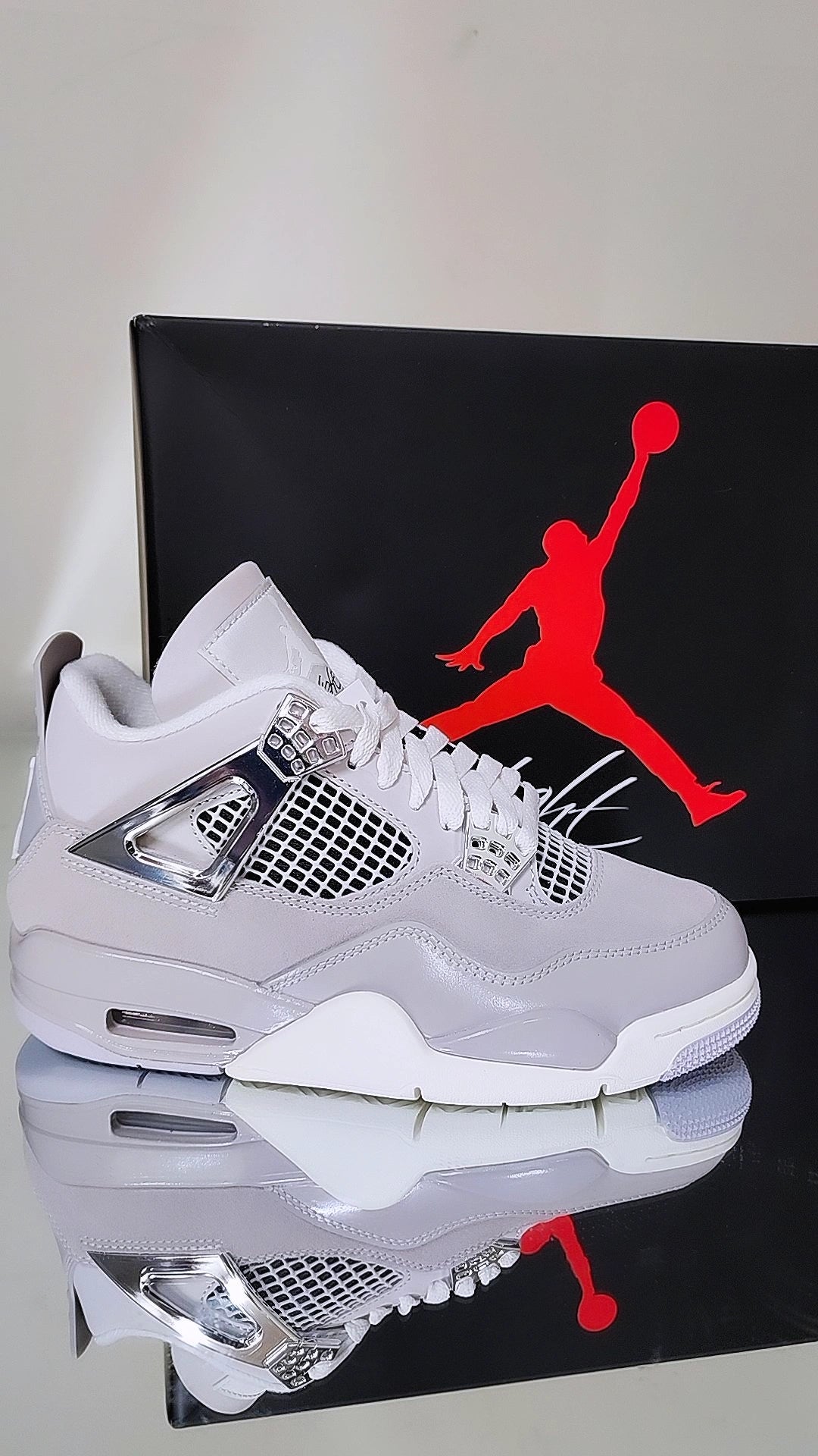 Jordan 4 Frozen Moments